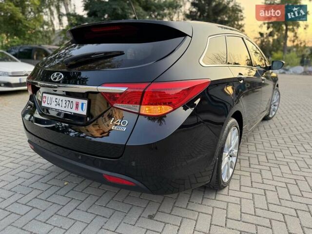 Чорний Хендай і40, об'ємом двигуна 1.7 л та пробігом 214 тис. км за 8999 $, фото 14 на Automoto.ua