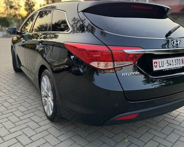 Чорний Хендай і40, об'ємом двигуна 1.7 л та пробігом 214 тис. км за 8999 $, фото 20 на Automoto.ua