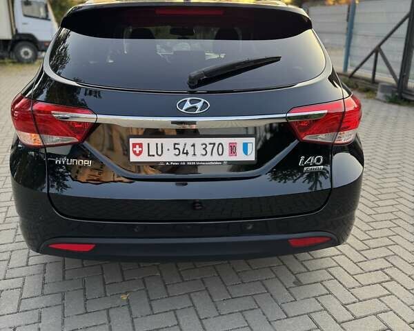 Чорний Хендай і40, об'ємом двигуна 1.7 л та пробігом 214 тис. км за 8999 $, фото 18 на Automoto.ua