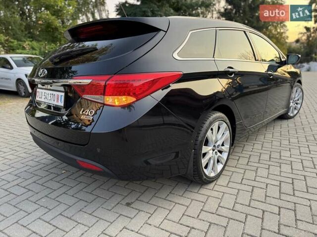 Чорний Хендай і40, об'ємом двигуна 1.7 л та пробігом 214 тис. км за 8999 $, фото 12 на Automoto.ua