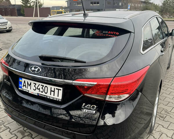 Чорний Хендай і40, об'ємом двигуна 1.69 л та пробігом 198 тис. км за 9300 $, фото 3 на Automoto.ua
