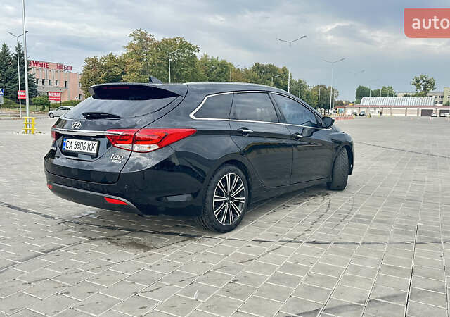 Чорний Хендай і40, об'ємом двигуна 1.7 л та пробігом 212 тис. км за 11900 $, фото 5 на Automoto.ua