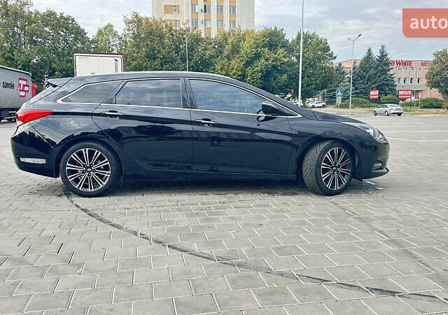 Чорний Хендай і40, об'ємом двигуна 1.7 л та пробігом 212 тис. км за 11900 $, фото 4 на Automoto.ua