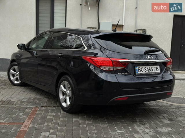 Синій Хендай і40, об'ємом двигуна 1.69 л та пробігом 275 тис. км за 8100 $, фото 7 на Automoto.ua