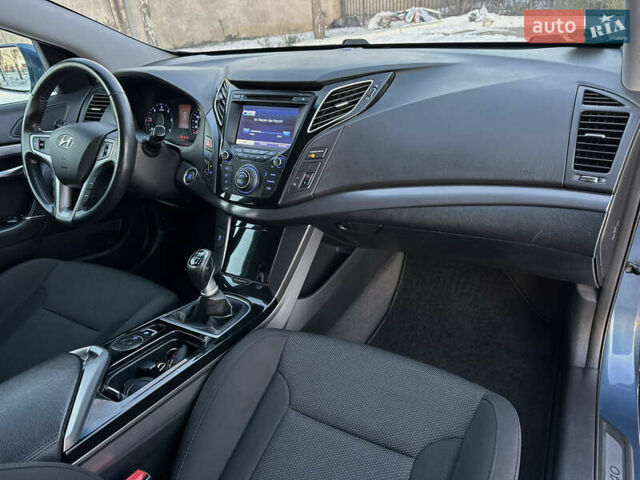 Синій Хендай і40, об'ємом двигуна 1.69 л та пробігом 173 тис. км за 10300 $, фото 21 на Automoto.ua