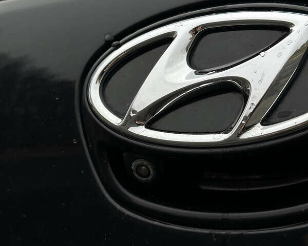 Черный Хендай Ioniq, объемом двигателя 0 л и пробегом 134 тыс. км за 13200 $, фото 10 на Automoto.ua