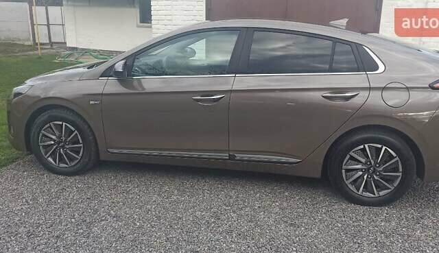 Коричневый Хендай Ioniq, объемом двигателя 0 л и пробегом 87 тыс. км за 15000 $, фото 14 на Automoto.ua