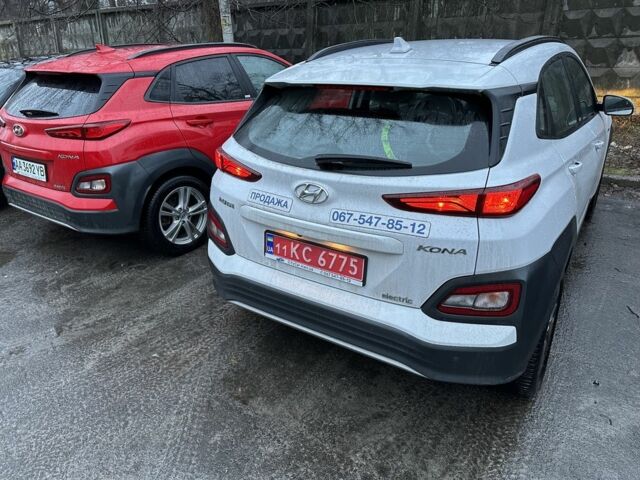 Красный Хендай Ioniq, объемом двигателя 0 л и пробегом 15 тыс. км за 16965 $, фото 1 на Automoto.ua