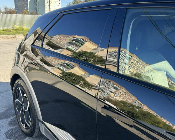 Черный Хендай Ioniq 5, объемом двигателя 0 л и пробегом 101 тыс. км за 28000 $, фото 33 на Automoto.ua