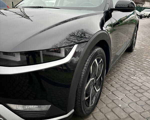 Черный Хендай Ioniq 5, объемом двигателя 0 л и пробегом 105 тыс. км за 23500 $, фото 7 на Automoto.ua