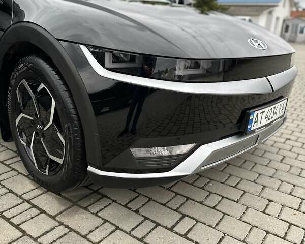 Черный Хендай Ioniq 5, объемом двигателя 0 л и пробегом 70 тыс. км за 24000 $, фото 2 на Automoto.ua