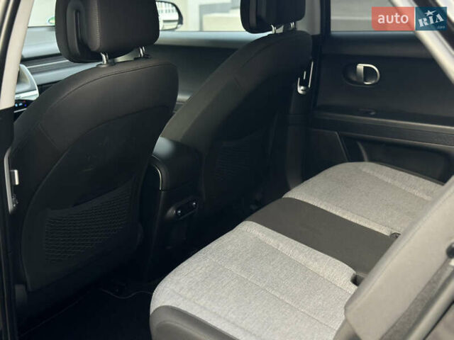 Черный Хендай Ioniq 5, объемом двигателя 0 л и пробегом 156 тыс. км за 22999 $, фото 75 на Automoto.ua