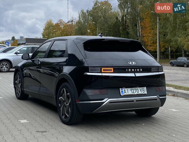 Черный Хендай Ioniq 5, объемом двигателя 0 л и пробегом 54 тыс. км за 28500 $, фото 3 на Automoto.ua