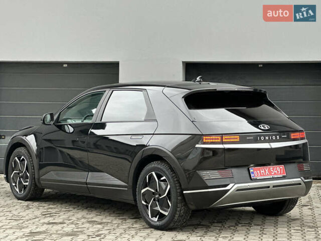 Черный Хендай Ioniq 5, объемом двигателя 0 л и пробегом 156 тыс. км за 22999 $, фото 3 на Automoto.ua