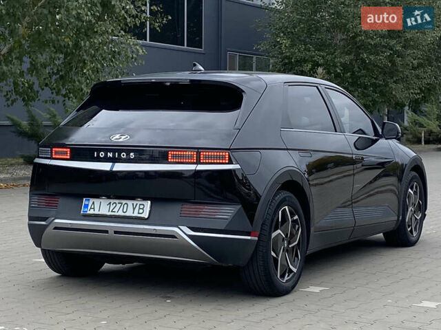 Черный Хендай Ioniq 5, объемом двигателя 0 л и пробегом 54 тыс. км за 28500 $, фото 2 на Automoto.ua