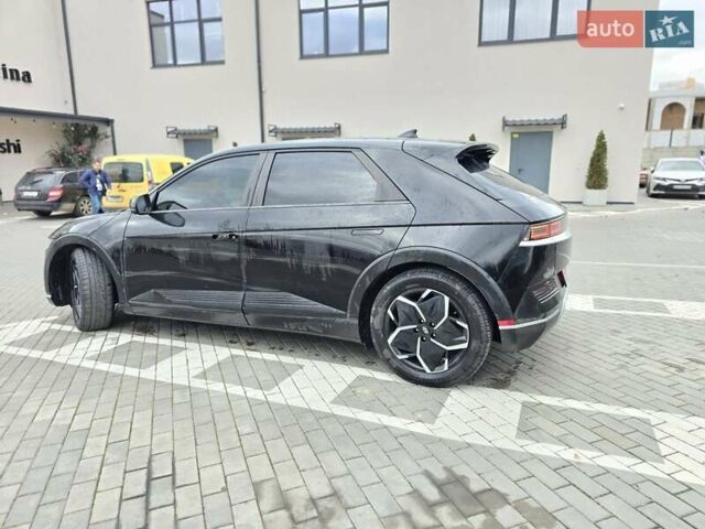 Черный Хендай Ioniq 5, объемом двигателя 0 л и пробегом 105 тыс. км за 19900 $, фото 2 на Automoto.ua