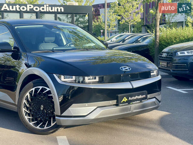 Черный Хендай Ioniq 5, объемом двигателя 0 л и пробегом 14 тыс. км за 27600 $, фото 1 на Automoto.ua