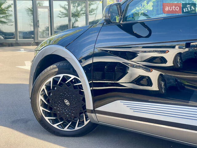 Черный Хендай Ioniq 5, объемом двигателя 0 л и пробегом 14 тыс. км за 27600 $, фото 6 на Automoto.ua