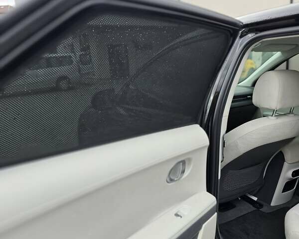 Черный Хендай Ioniq 5, объемом двигателя 0 л и пробегом 105 тыс. км за 19900 $, фото 7 на Automoto.ua