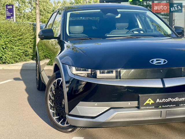 Черный Хендай Ioniq 5, объемом двигателя 0 л и пробегом 14 тыс. км за 27600 $, фото 2 на Automoto.ua