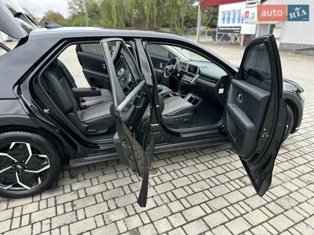 Черный Хендай Ioniq 5, объемом двигателя 0 л и пробегом 70 тыс. км за 23500 $, фото 25 на Automoto.ua