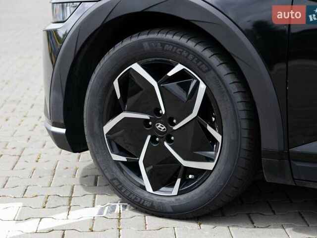 Черный Хендай Ioniq 5, объемом двигателя 0 л и пробегом 56 тыс. км за 25500 $, фото 2 на Automoto.ua