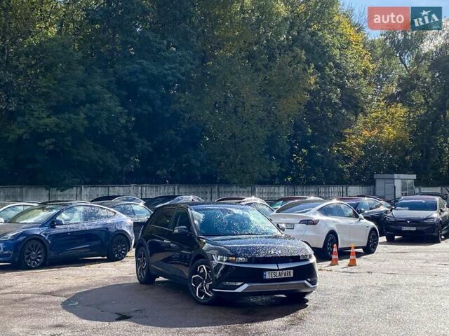 Черный Хендай Ioniq 5, объемом двигателя 0 л и пробегом 22 тыс. км за 28999 $, фото 1 на Automoto.ua