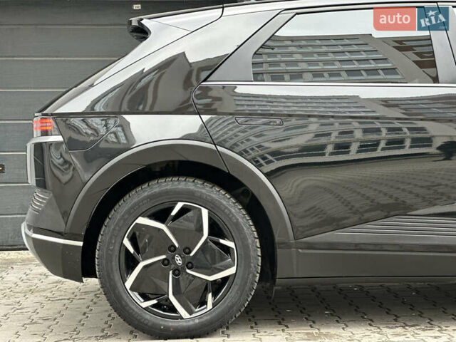 Черный Хендай Ioniq 5, объемом двигателя 0 л и пробегом 156 тыс. км за 22999 $, фото 26 на Automoto.ua