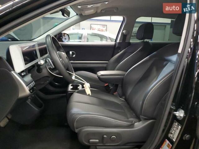 Черный Хендай Ioniq 5, объемом двигателя 0 л и пробегом 22 тыс. км за 8800 $, фото 6 на Automoto.ua