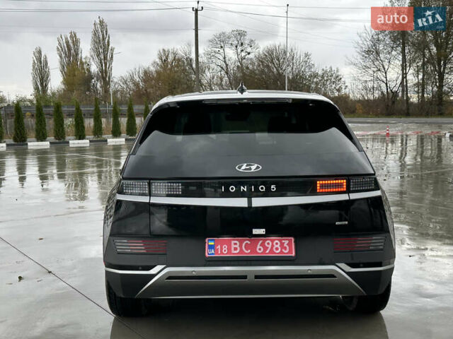 Черный Хендай Ioniq 5, объемом двигателя 0 л и пробегом 2 тыс. км за 26999 $, фото 23 на Automoto.ua