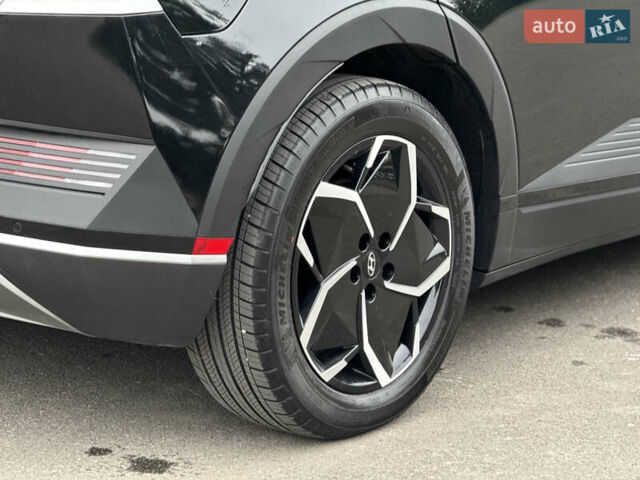 Черный Хендай Ioniq 5, объемом двигателя 0 л и пробегом 6 тыс. км за 28999 $, фото 14 на Automoto.ua