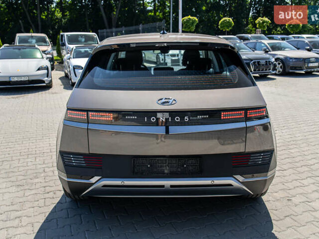 Коричневый Хендай Ioniq 5, объемом двигателя 0 л и пробегом 80 тыс. км за 22900 $, фото 8 на Automoto.ua