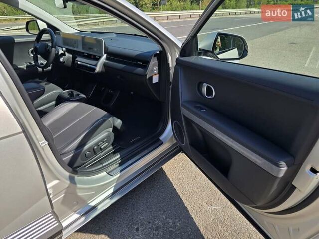 Серый Хендай Ioniq 5, объемом двигателя 0 л и пробегом 54 тыс. км за 34499 $, фото 84 на Automoto.ua