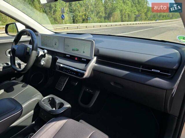 Серый Хендай Ioniq 5, объемом двигателя 0 л и пробегом 54 тыс. км за 34499 $, фото 92 на Automoto.ua