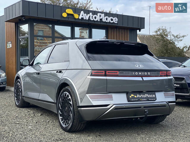Серый Хендай Ioniq 5, объемом двигателя 0 л и пробегом 130 тыс. км за 28200 $, фото 2 на Automoto.ua