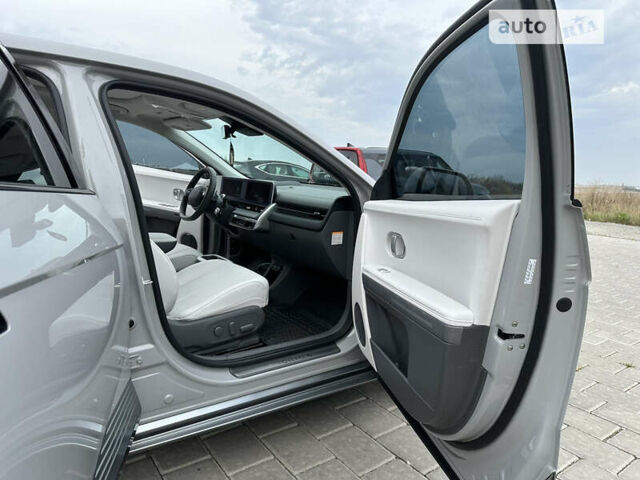 Серый Хендай Ioniq 5, объемом двигателя 0 л и пробегом 55 тыс. км за 29999 $, фото 27 на Automoto.ua