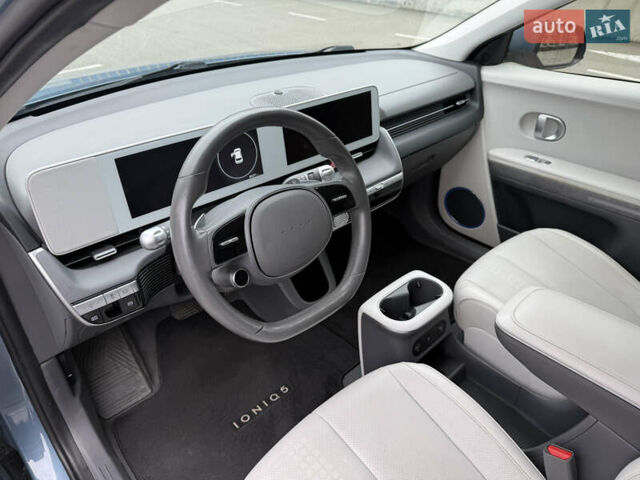 Синий Хендай Ioniq 5, объемом двигателя 0 л и пробегом 84 тыс. км за 23400 $, фото 5 на Automoto.ua