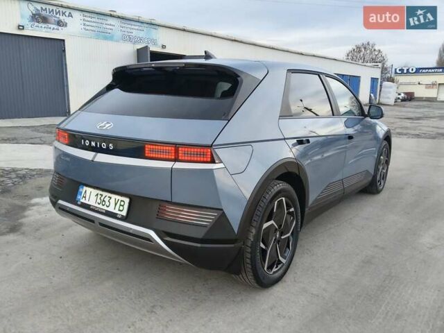 Синий Хендай Ioniq 5, объемом двигателя 0 л и пробегом 9 тыс. км за 25700 $, фото 4 на Automoto.ua