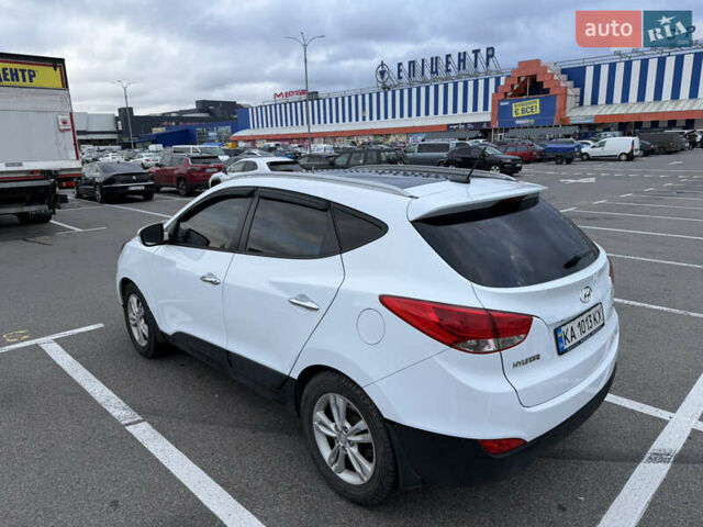 Білий Хендай іх35, об'ємом двигуна 2 л та пробігом 122 тис. км за 11500 $, фото 12 на Automoto.ua