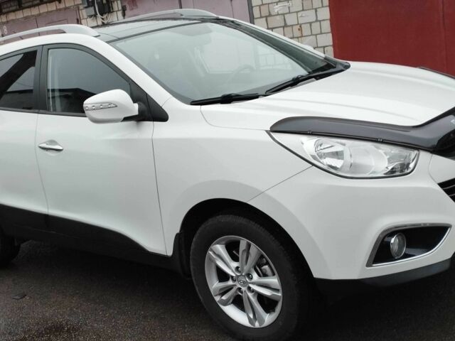 Білий Хендай іх35, об'ємом двигуна 2 л та пробігом 215 тис. км за 9900 $, фото 7 на Automoto.ua