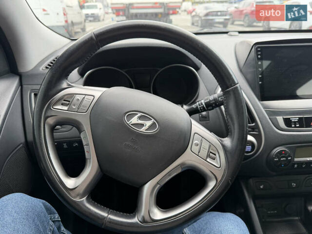 Білий Хендай іх35, об'ємом двигуна 2 л та пробігом 122 тис. км за 11500 $, фото 20 на Automoto.ua