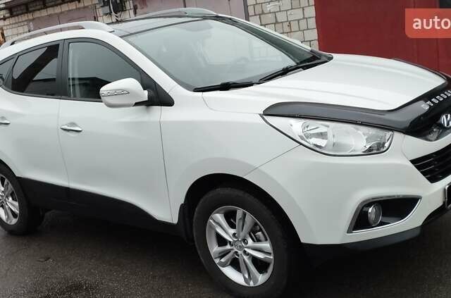 Белый Хендай их35, объемом двигателя 2 л и пробегом 215 тыс. км за 9900 $, фото 7 на Automoto.ua