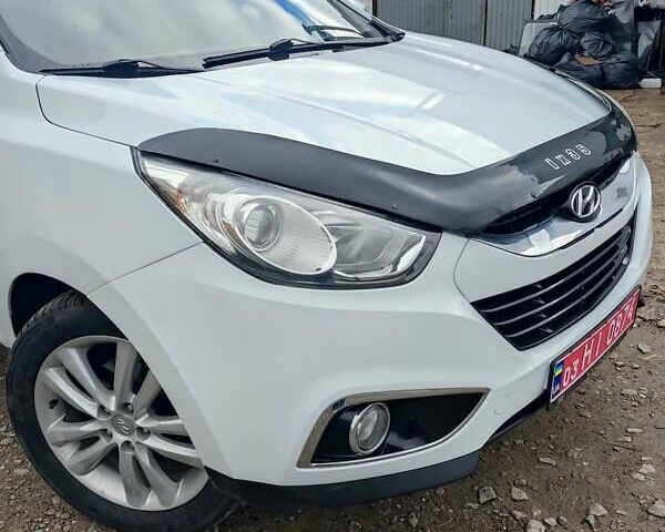 Білий Хендай іх35, об'ємом двигуна 2 л та пробігом 200 тис. км за 10800 $, фото 13 на Automoto.ua