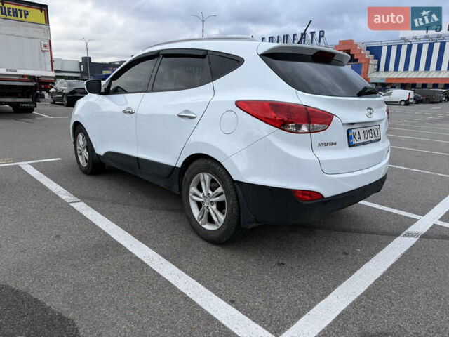 Білий Хендай іх35, об'ємом двигуна 2 л та пробігом 122 тис. км за 11500 $, фото 9 на Automoto.ua