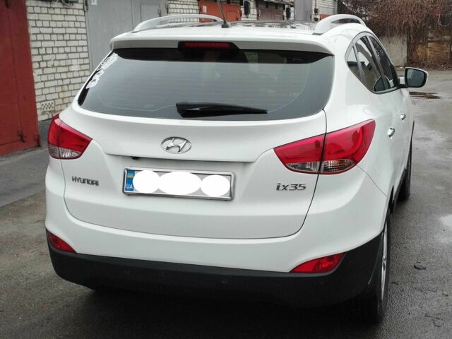 Білий Хендай іх35, об'ємом двигуна 2 л та пробігом 215 тис. км за 9900 $, фото 5 на Automoto.ua