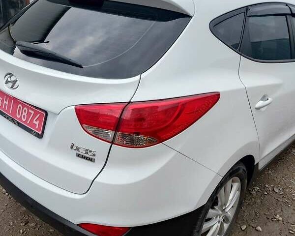 Білий Хендай іх35, об'ємом двигуна 2 л та пробігом 200 тис. км за 10800 $, фото 11 на Automoto.ua