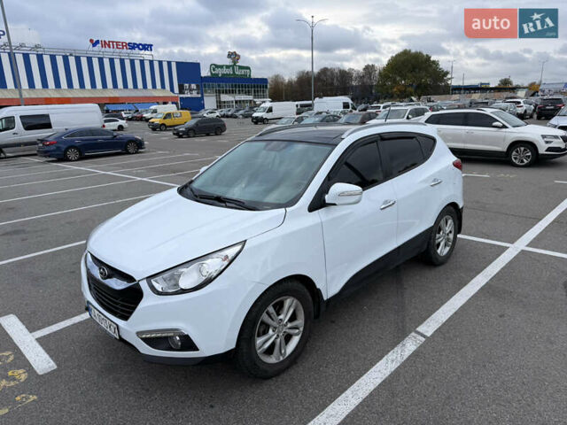 Білий Хендай іх35, об'ємом двигуна 2 л та пробігом 122 тис. км за 11500 $, фото 15 на Automoto.ua
