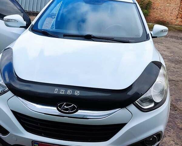 Білий Хендай іх35, об'ємом двигуна 2 л та пробігом 200 тис. км за 10800 $, фото 10 на Automoto.ua
