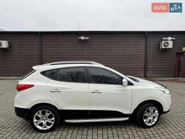 Белый Хендай их35, объемом двигателя 2.36 л и пробегом 111 тыс. км за 11999 $, фото 10 на Automoto.ua