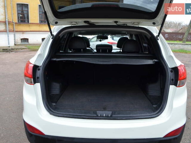 Белый Хендай их35, объемом двигателя 2.36 л и пробегом 202 тыс. км за 11300 $, фото 22 на Automoto.ua